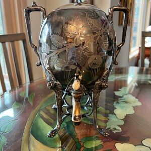 Ornate Silver-Plated Beverage Dispenser with Floral Engraving